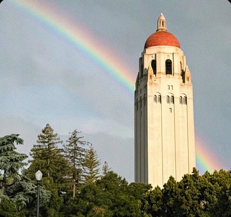 Stanford Hoover Tower with a rainbow arching over it